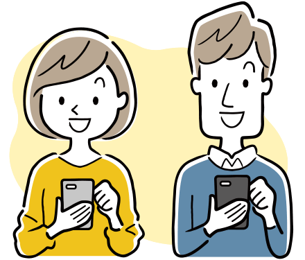 男女がスマホを見ている画像